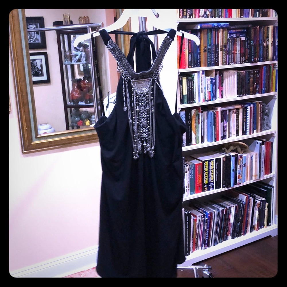 Sky black top with silver necklace. M.
